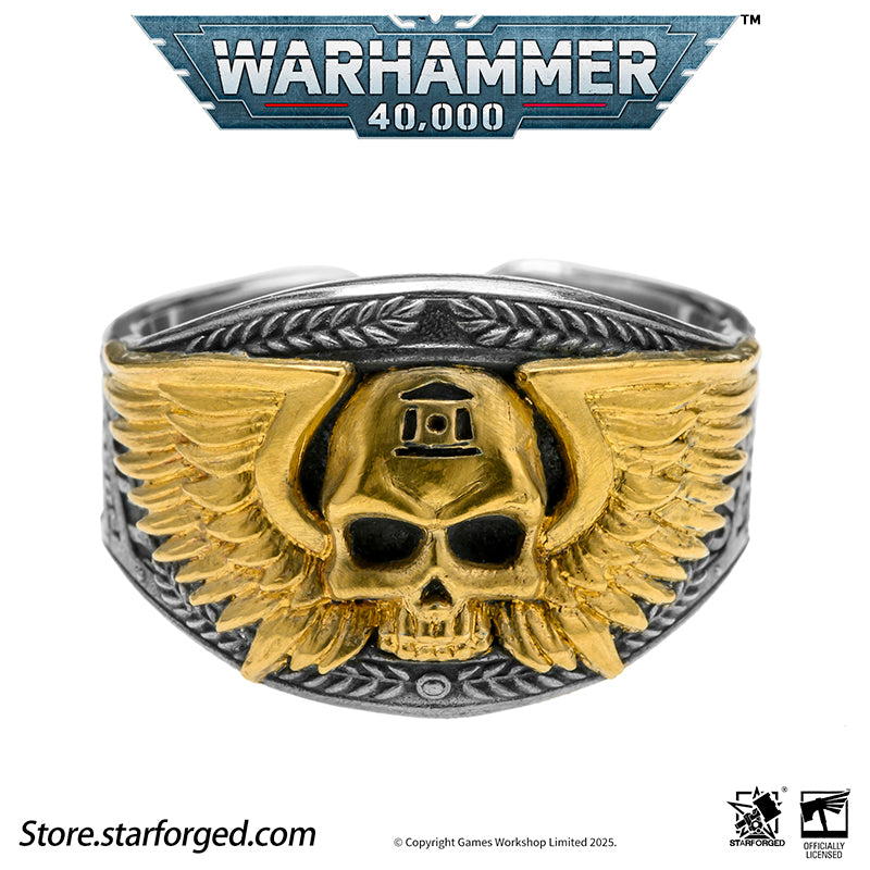 Astra Militarum De Gloria Cadia Ring Cadian Shock Troopers Warhammer Memorial Ring Gold & Silver A ring depicting the winged skull emblem of the Astra Militarum. With the Cadian Gate’s logo etched on its forehead, representing the heroic Cadian Shock Troopers. Their famous warcry, ‘Cadia stands!’ echoes with it.