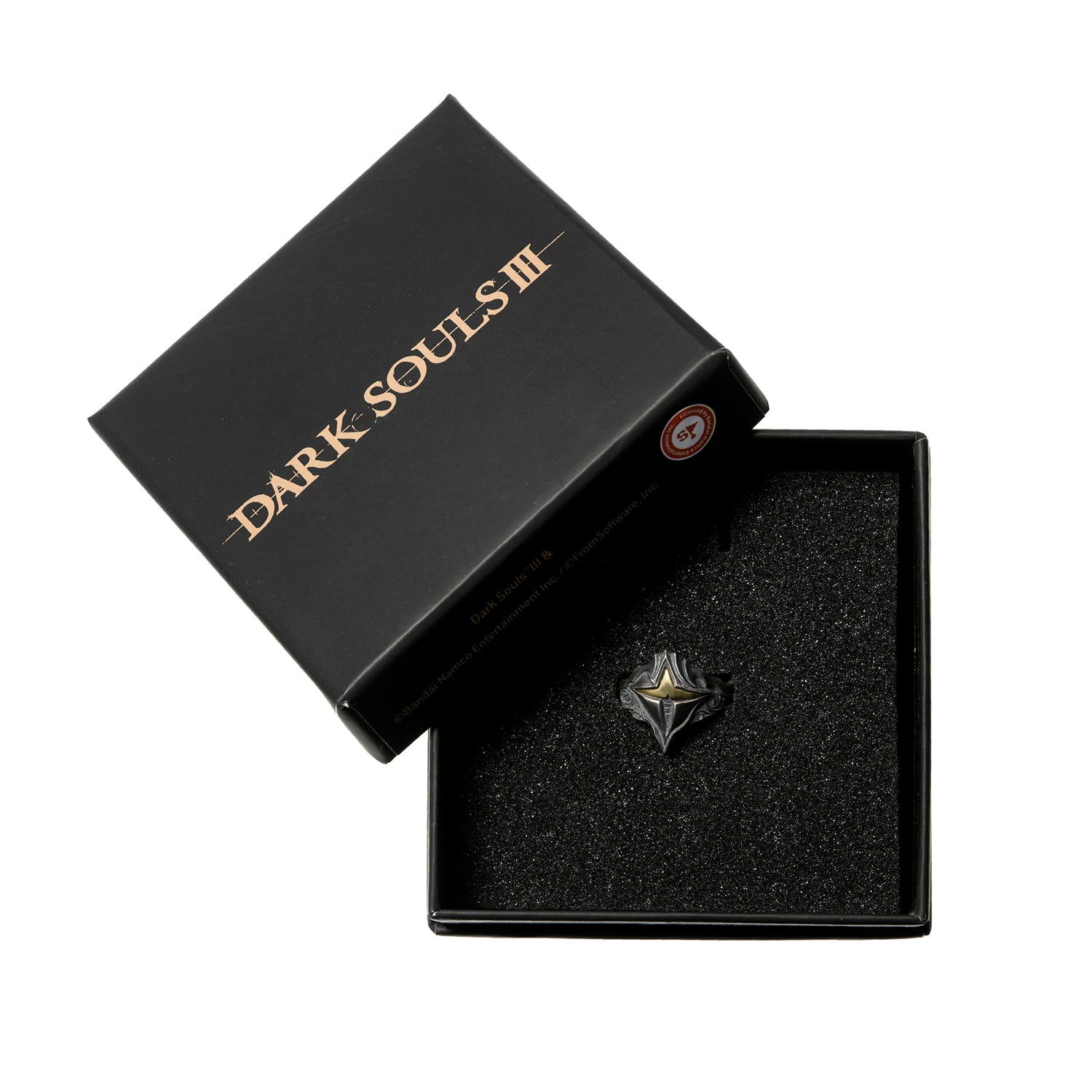 Calamity Ring

A ring made from the orange eye of a calamitous dragon. Receive double damage.This ring has no useful powers, and is merely a symbol of dragon worship, a thing quietly passed down amongst its most fervent adherents, some of whom become convinced the task has been bestowed upon them as a sacred duty.

PRODUCT PARAMETER
Brand: STARFORGED (Licensed by Bandai Namco Entertainment Inc.)
Name: Calamity Ring
Material: 925 Silver &amp; Brass
Size: Height 19.1 mm &amp; Width 21.1 mm
Weight: Approx. 5.5