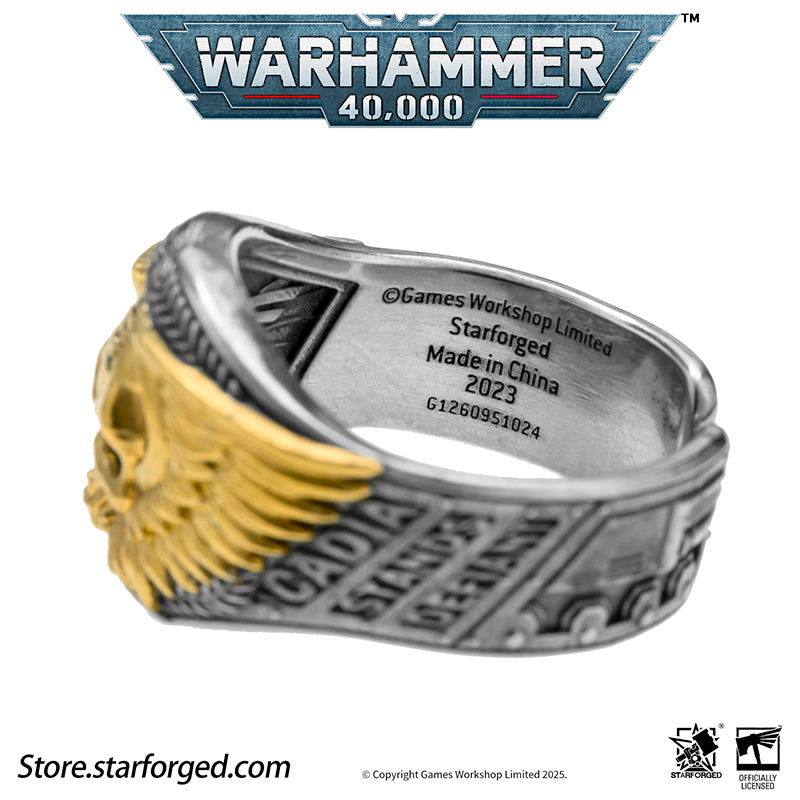 Astra Militarum De Gloria Cadia Ring Cadian Shock Troopers Warhammer Memorial Ring Gold & Silver A ring depicting the winged skull emblem of the Astra Militarum. With the Cadian Gate’s logo etched on its forehead, representing the heroic Cadian Shock Troopers. Their famous warcry, ‘Cadia stands!’ echoes with it.