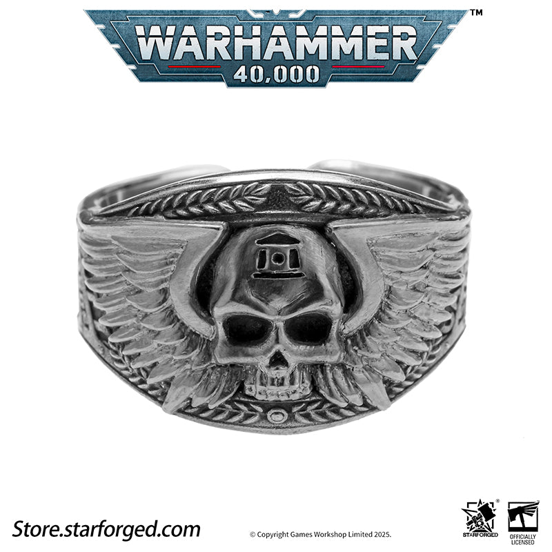 Astra Militarum De Gloria Cadia Ring Cadian Shock Troopers Warhammer Memorial Ring Gold & Silver A ring depicting the winged skull emblem of the Astra Militarum. With the Cadian Gate’s logo etched on its forehead, representing the heroic Cadian Shock Troopers. Their famous warcry, ‘Cadia stands!’ echoes with it.