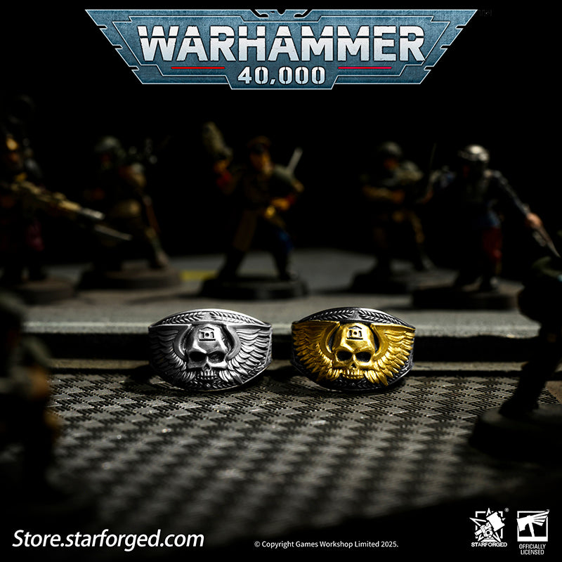 Astra Militarum De Gloria Cadia Ring Cadian Shock Troopers Warhammer Memorial Ring Gold & Silver A ring depicting the winged skull emblem of the Astra Militarum. With the Cadian Gate’s logo etched on its forehead, representing the heroic Cadian Shock Troopers. Their famous warcry, ‘Cadia stands!’ echoes with it.