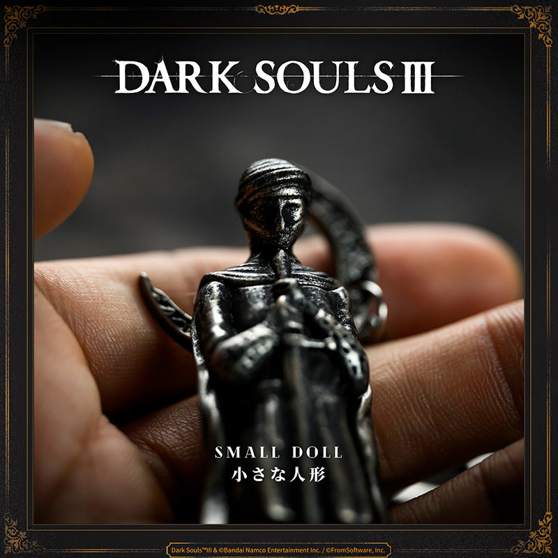 Starforged DARK SOULS III Small Doll NFC Keychain Accessories Game Merchandise Officially Authorized Small silverwork doll depicting a young squire.In the legendary old city of Irithyll situated in the Boreal Valley, the Pontiff Sulyvahn gave this doll to valued subjects, so that they might use it to cross the barrier when they return home.Listen carefully, and you can hear it say, "Wherever you go, the moon still sets in Irithyll. Wherever you may be, Irithyll is your home."